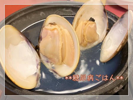 焼き蛤を殻ごとアップで撮影 香ばしく焼けた身が見える